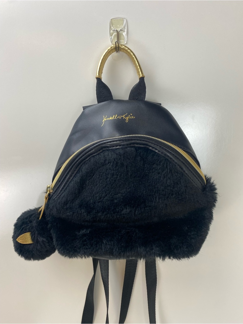 Kendall & Kylie Black Faux Fur Mini Backpack with Gold Accents